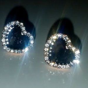 Attractive diomond framed black heart earrings